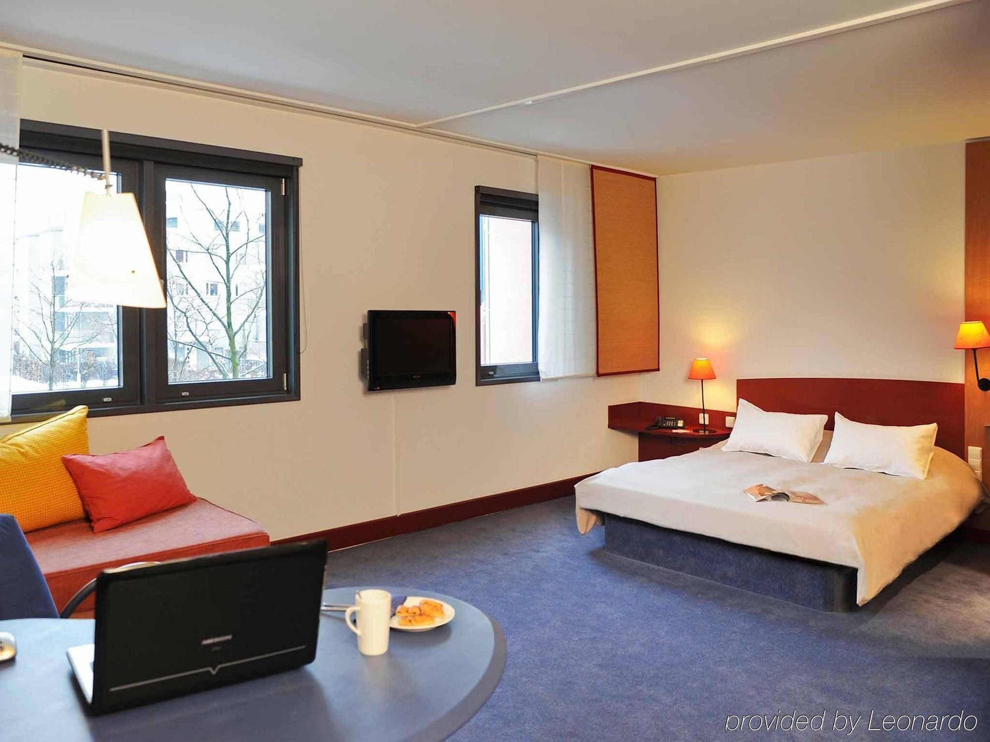 فندق أجنحة نوفوتيل ميونيخ باركستاد شوابينخ الغرفة الصورة