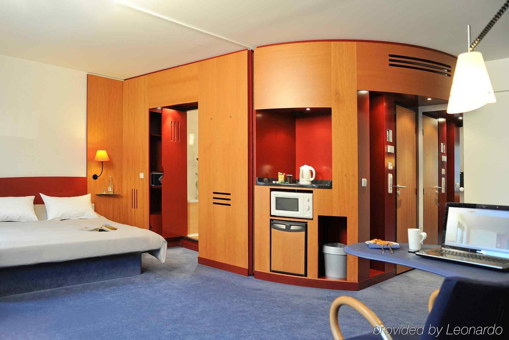 فندق أجنحة نوفوتيل ميونيخ باركستاد شوابينخ الغرفة الصورة